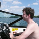 Here's tom driving the boat.
